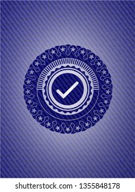 tick icon inside emblem with jean texture