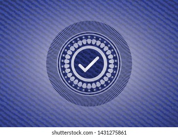 tick icon inside emblem with jean texture