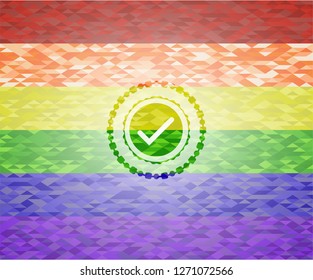 tick icon inside emblem on mosaic background with the colors of the LGBT flag