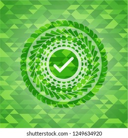 tick icon inside green emblem with mosaic ecological style background