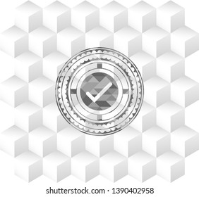 tick icon inside grey badge with geometric cube white background