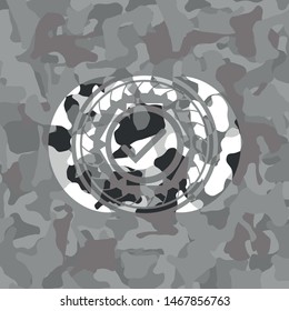 tick icon inside grey camouflaged emblem