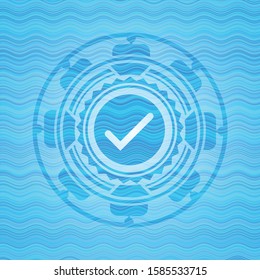 tick icon inside light blue water badge.