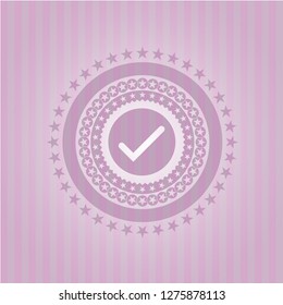 tick icon inside pink emblem