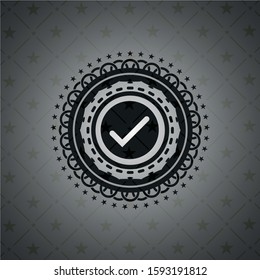 tick icon inside realistic dark emblem