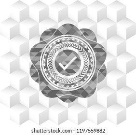 tick icon inside realistic grey emblem with geometric cube white background