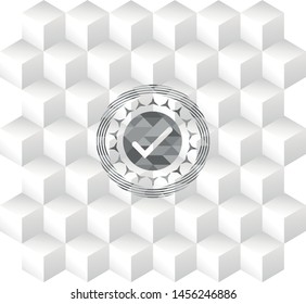 tick icon inside realistic grey emblem with geometric cube white background