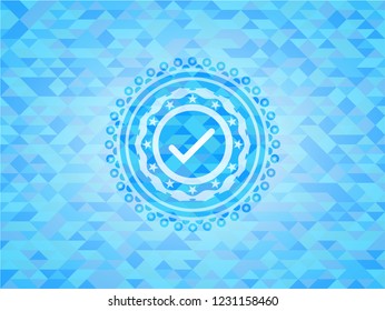 tick icon inside realistic light blue mosaic emblem