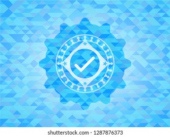 tick icon inside realistic light blue emblem. Mosaic background