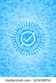 tick icon inside realistic light blue mosaic emblem