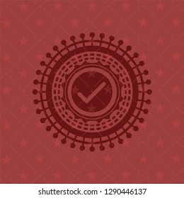 tick icon inside red icon or emblem