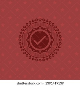 tick icon inside red icon or emblem
