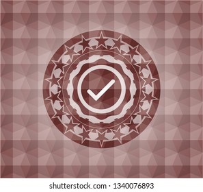 tick icon inside red seamless emblem or badge with abstract geometric polygonal pattern background.