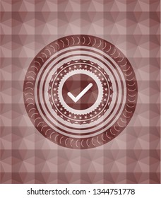 tick icon inside red seamless polygonal badge.