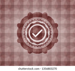 tick icon inside red seamless badge with geometric pattern background.