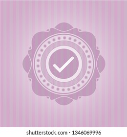tick icon inside retro pink emblem