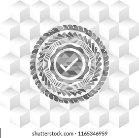 tick icon inside retro style grey emblem with geometric cube white background