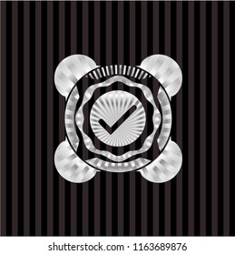 tick icon inside silver emblem or badge