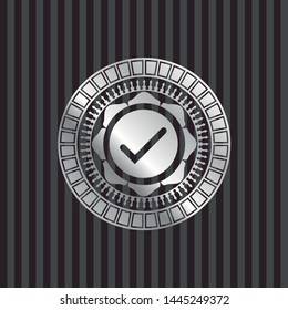 tick icon inside silver shiny emblem