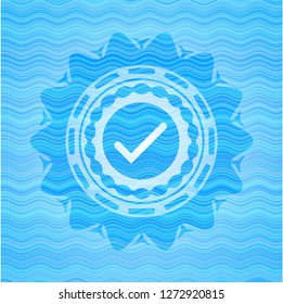 tick icon inside sky blue water emblem background.