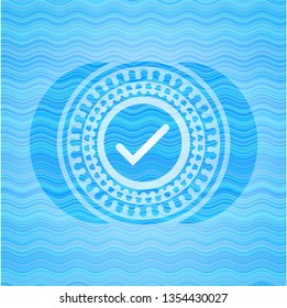 tick icon inside sky blue water badge.
