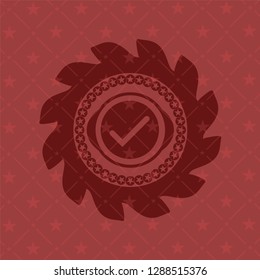 tick icon inside vintage red emblem