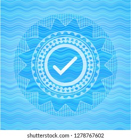 tick icon inside water style badge.