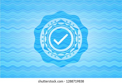 tick icon inside water wave concept style emblem.
