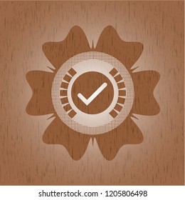 tick icon inside wood emblem. Vintage.