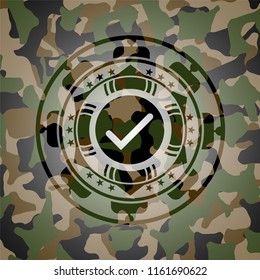 tick icon on camo pattern