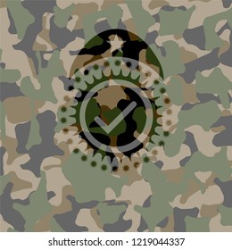 tick icon on camo pattern