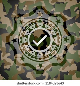 tick icon on camo texture