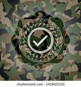 tick icon on camo texture