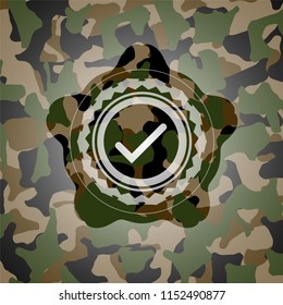 tick icon on camouflage pattern