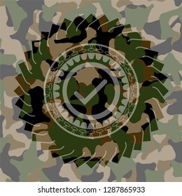 tick icon on camouflage pattern