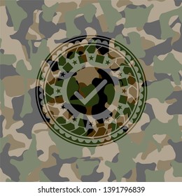 tick icon on camouflage pattern