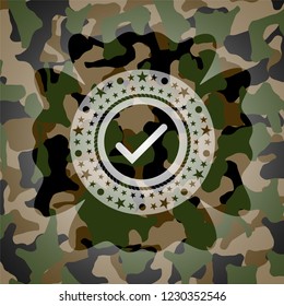 tick icon on camouflaged texture