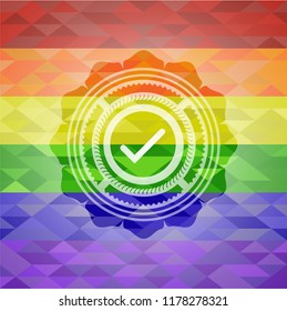 tick icon on mosaic background with the colors of the LGBT flag