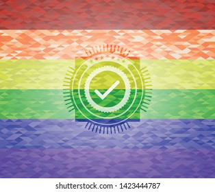 tick icon on mosaic background with the colors of the LGBT flag