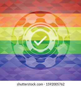 tick icon on mosaic background with the colors of the LGBT flag