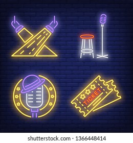 Tickets, spotlights and microphones neon signs set. Show invitation, entertainment, and concert design. Night bright neon sign, colorful billboard, light banner. Vector illustration in neon style.