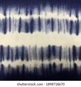Tie-dye textile pattern in indigo blue. 