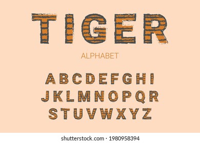 Tiger alphabet. Cute font  isolated on light orange background. Vector illustration.