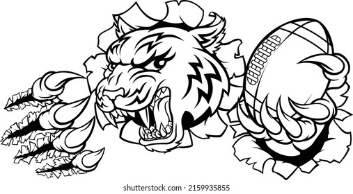 A tiger American Football player cartoon animal sports mascot holding a ball in its claw