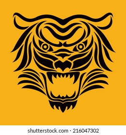 Tiger anger. Black tattoo. Vector illustration of a tiger head.