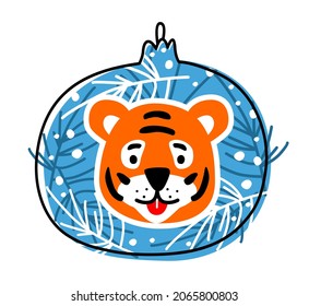 Tiger and Christmas tree toy. The stylized tiger sits in a Christmas tree toy on a blue background with branches. Funny doodles on a New Year's theme.
