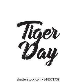 tiger day, text design. Vector calligraphy. Typography poster. Usable as background.
