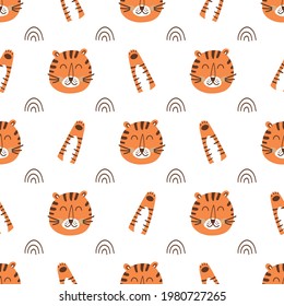 Tiger face pattern. Tiger head pattern. Cartoon cute tiger, wild cat paw background. Wild fabric design