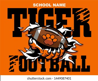 tiger football team design with claw holding ball for school, college or league