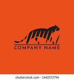 Tiger in the grass logo sign emblem pictogram vectror illustration
